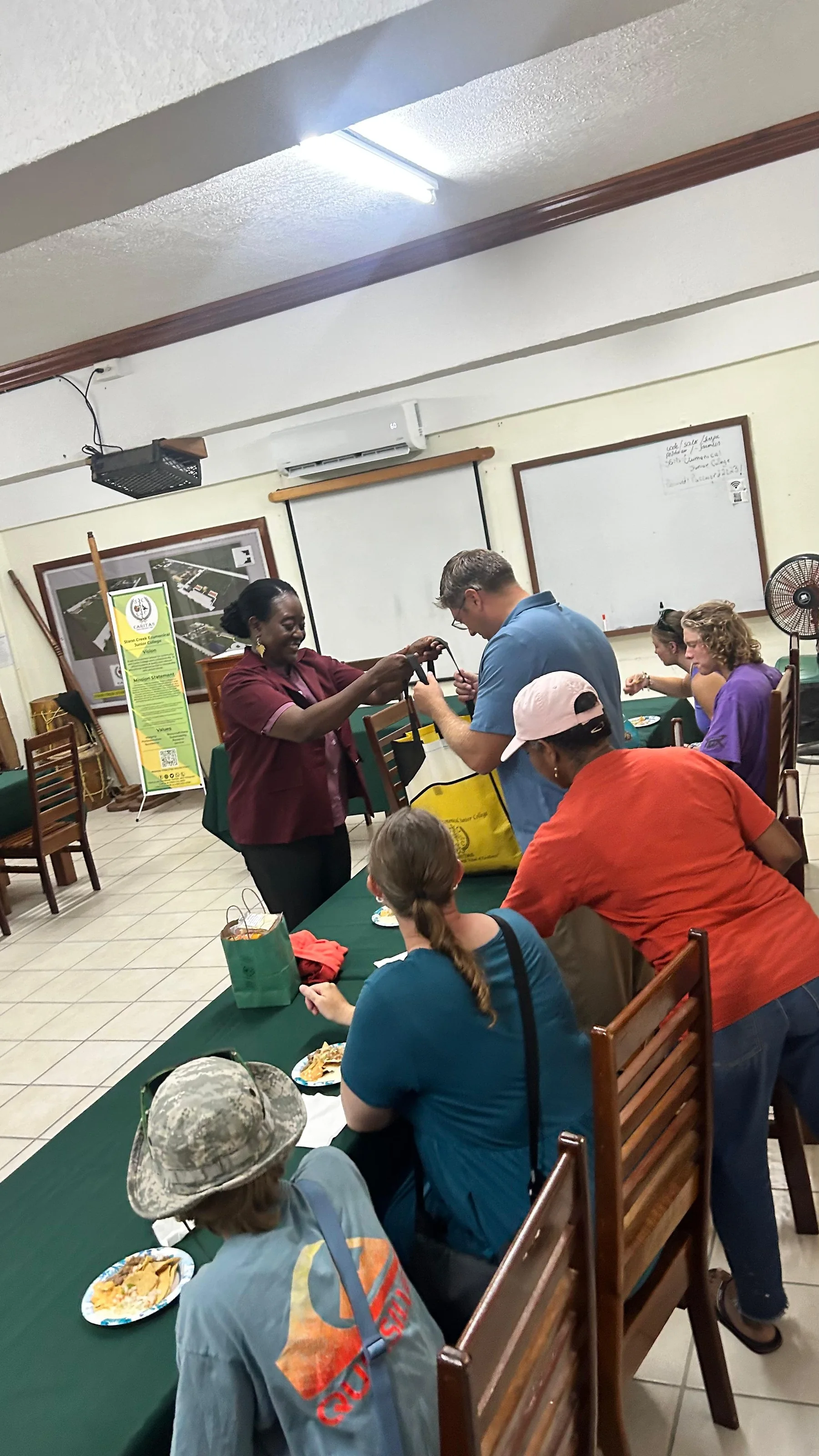 A financial literacy meeting with faculty in Belize