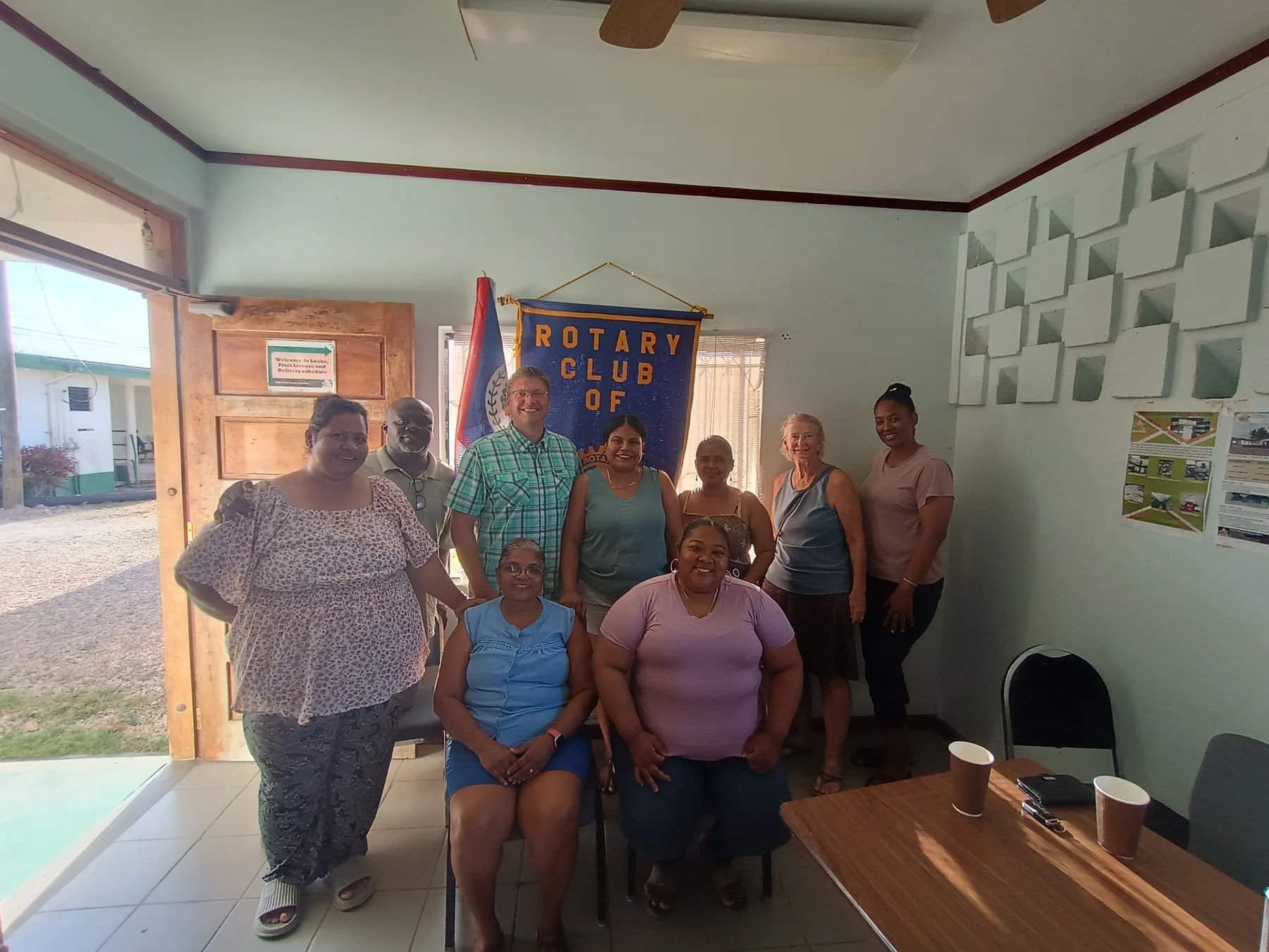 Rotary club members gathered together in Belize